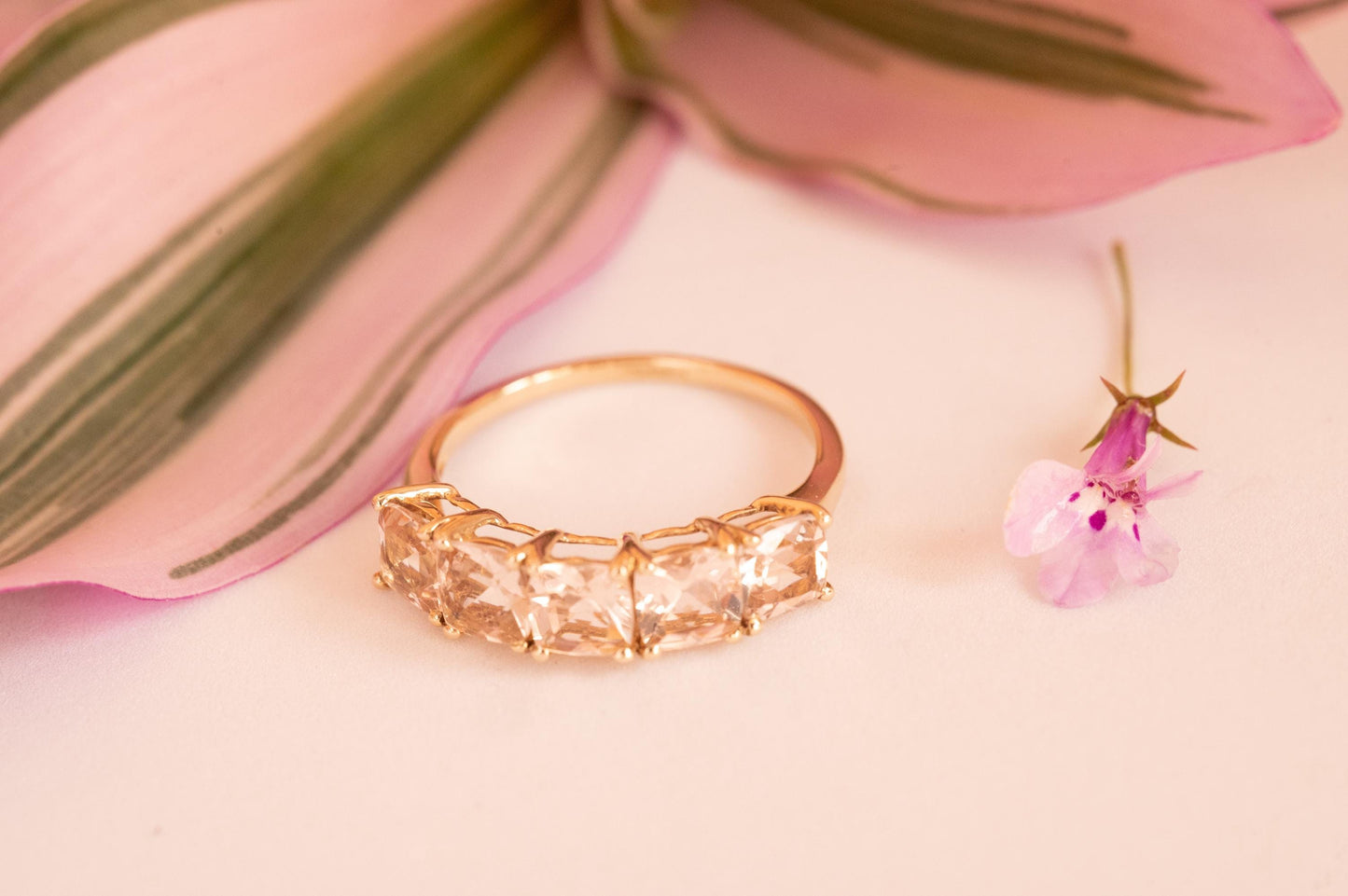 ring full view - 5 morganite clear pinkish stones. vintage 1980s ring.