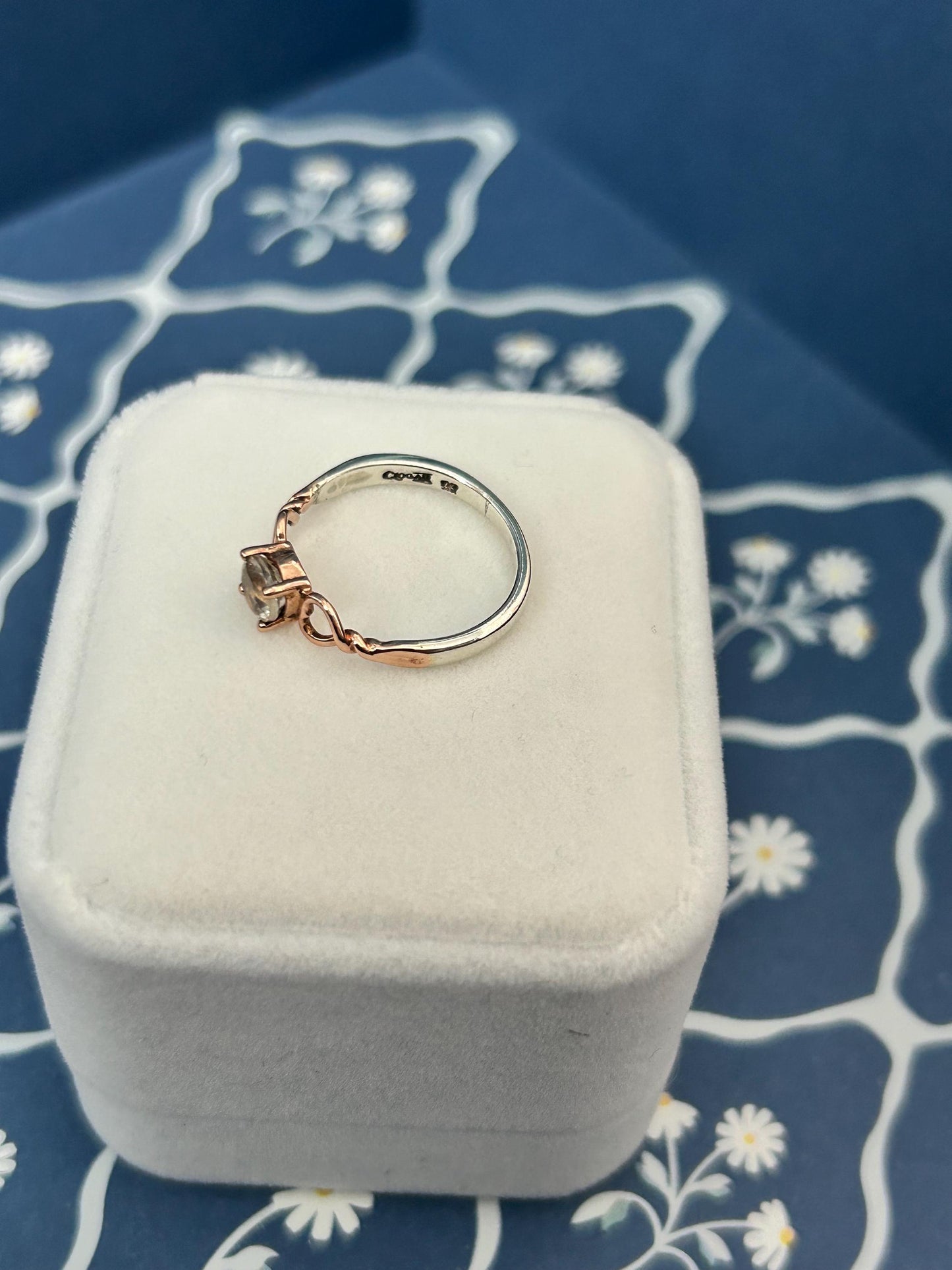 side profile hallmarked by Clogau gold - pretty ring unusual design