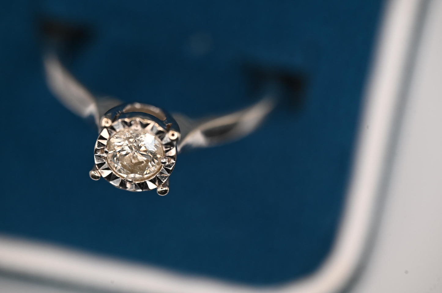 up close diamond is dazzling and maintains its beautiful appearance as a 70s vintage item set in white 9 carat gold from the United Kingdom .