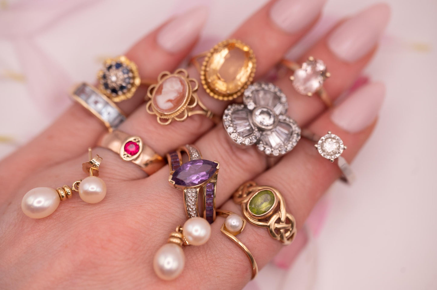 we have a variety of antique and vintage items here the diamond ring is shown on the finger and is beautiful with a dazzling clarity . Very dainty and a pretty vintage Ring