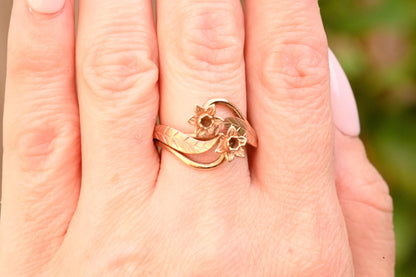 shown for scale- ring on finger. clogau jewellery. gold ring. daffodil. flower ring.