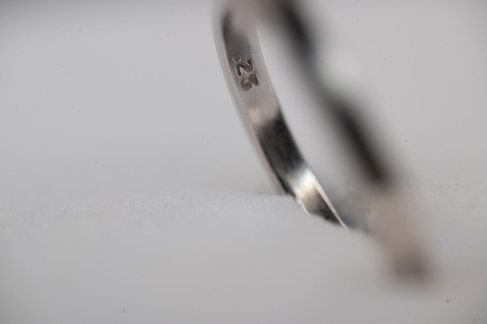 zero point .25 hallmark can be clearly seen on the ring - For peace of mind. Full hallmarks from the United Kingdom.