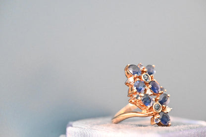 beautiful vintage ring, sapphires sparkle against the yellow gold making this look very glamorous and a perfect statement ring
