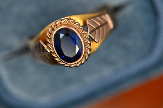 rare antique item from Victorian era United Kingdom. 22ct hallmark with natural large sapphire centre with ornate panel and etching.