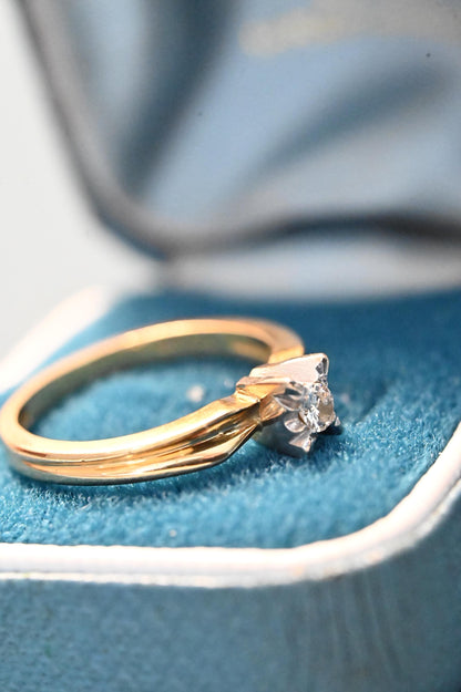 mid century 1960s diamond 18ct gold ring with art deco style  shown on shoulders - yellow gold with white gold surrounding diamond solitaire - a beautiful sentiment to a bygone era