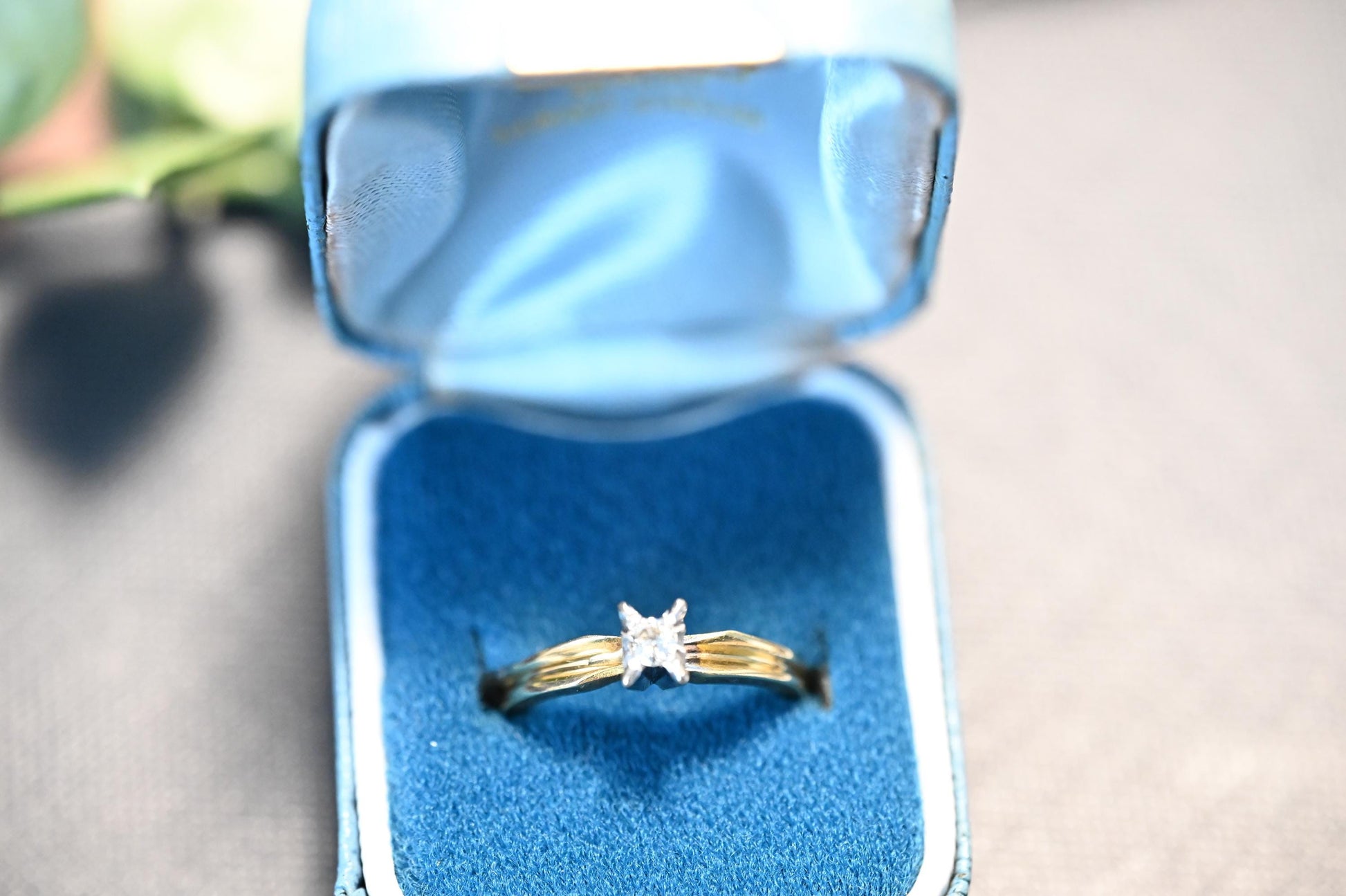 shown in vintage engagement box this stunning ring feature art deco style edging enhancing the brilliant cut white diamond