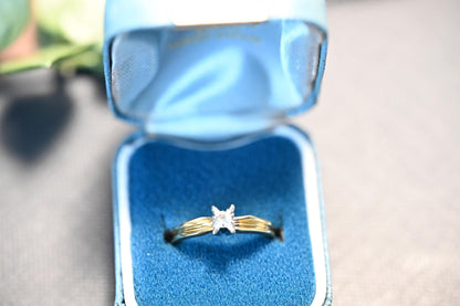 shown in vintage engagement box this stunning ring feature art deco style edging enhancing the brilliant cut white diamond