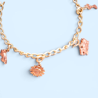 Vintage Clogau Charm Bracelet in 9ct Gold with 4 Charms 7" - Welsh Gold